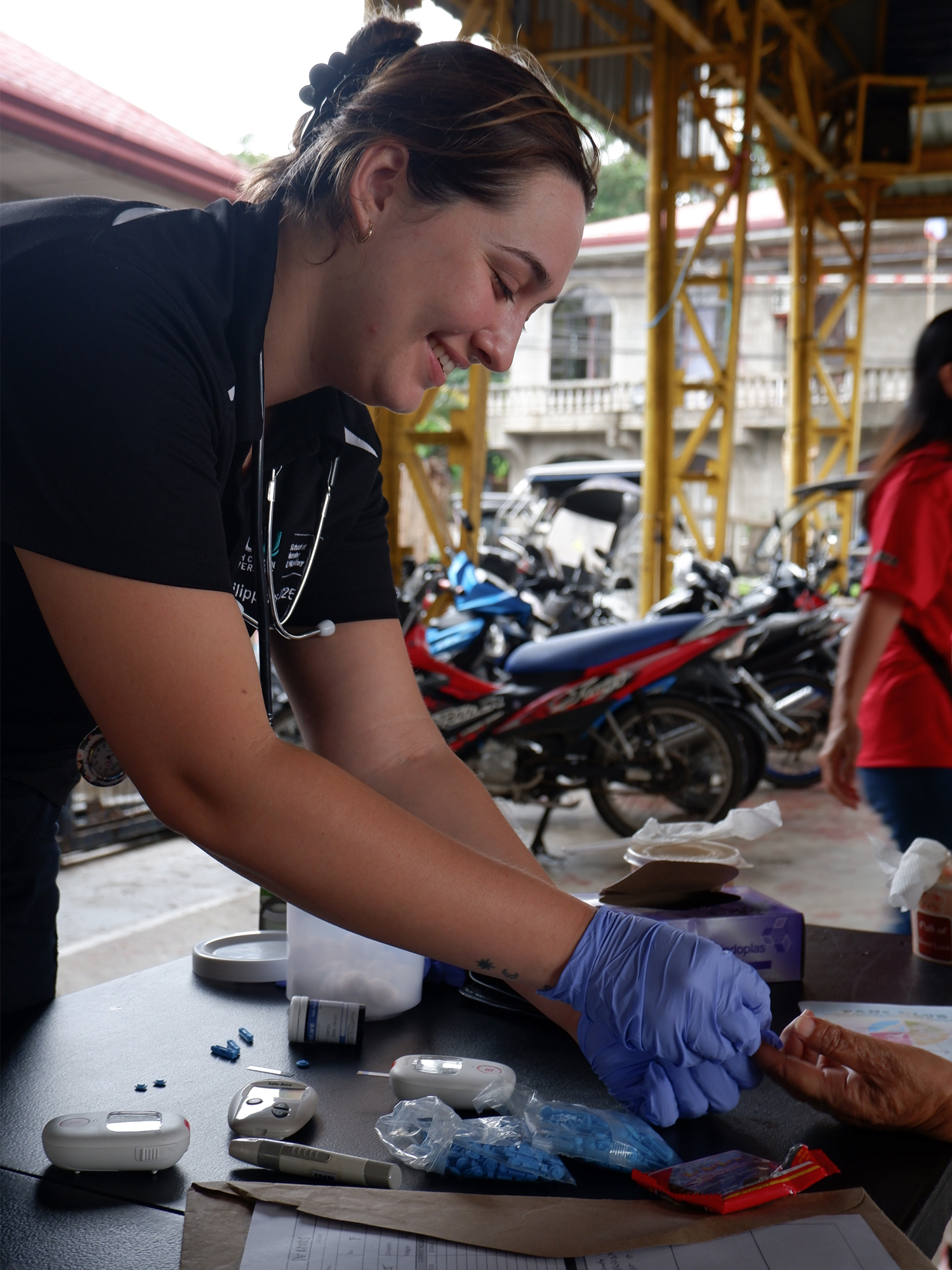 A simple touch, a shared  smile, and the healing power of presence in the heart of the community